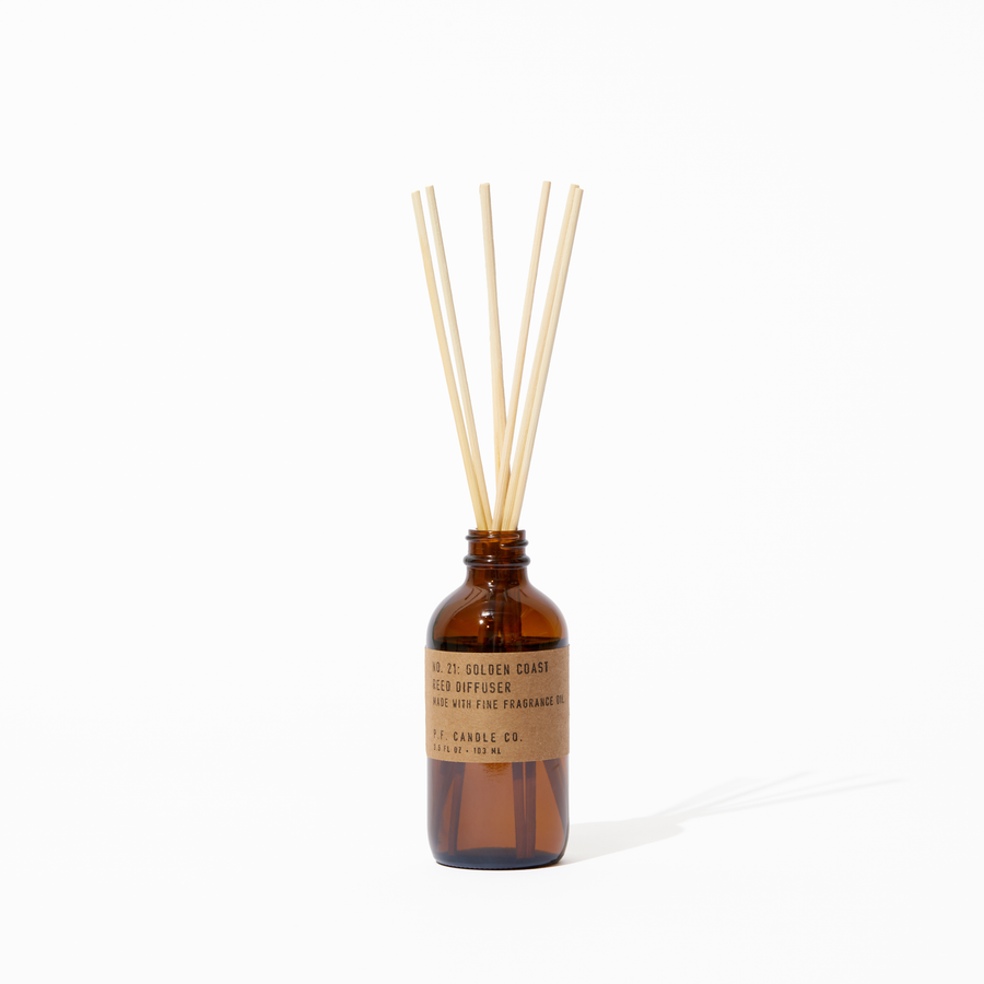 P.F. Candle Co. Golden Coast Reed Diffuser - Product - Our Reed Diffusers come in apothecary-inspired amber glass bottles with our signature kraft label and rattan reeds. Low-maintenance scent throw, all day long - no match necessary.