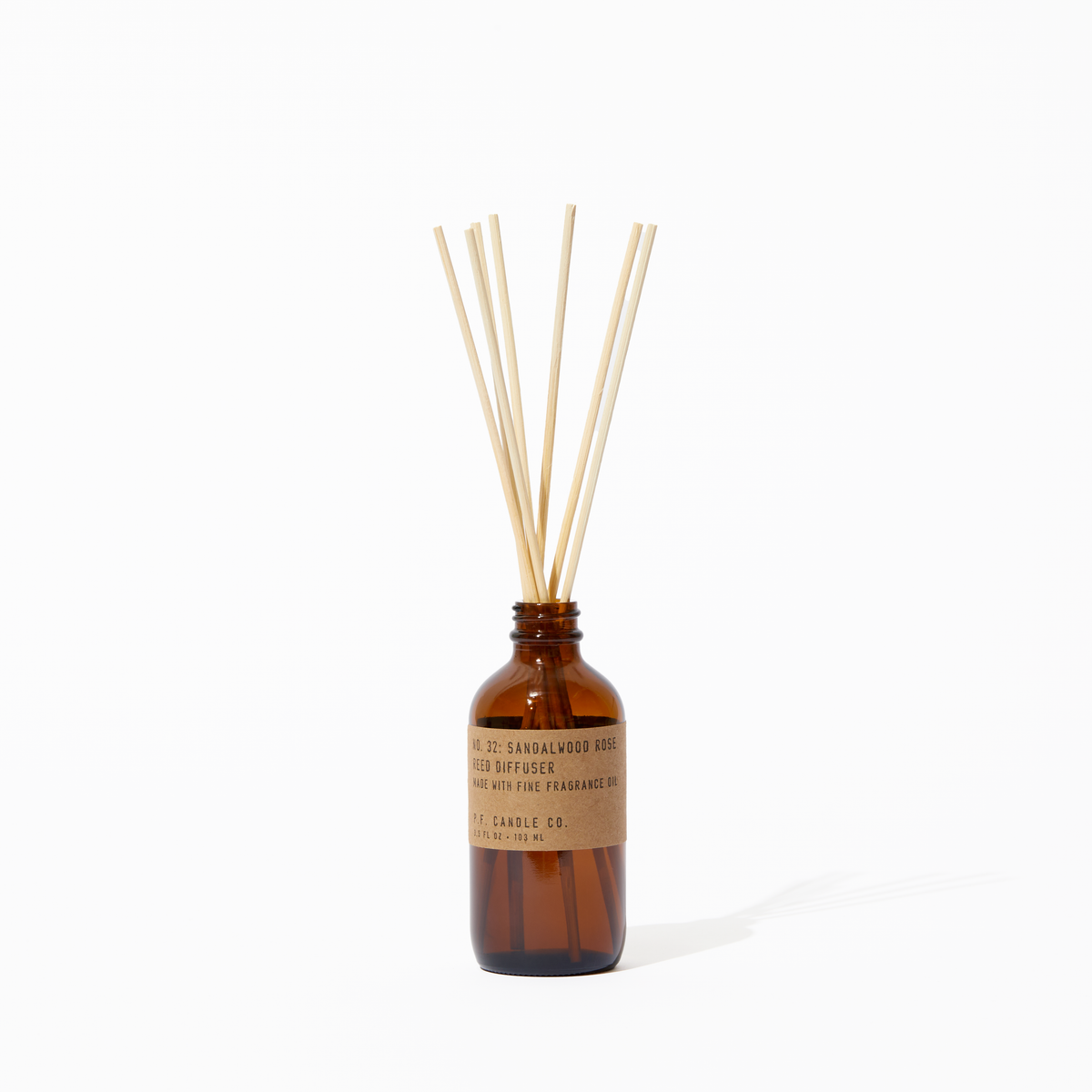 P.F. Candle Co. Sandalwood Rose Reed Diffuser - Product - Our Reed Diffusers come in apothecary-inspired amber glass bottles with our signature kraft label and rattan reeds. Low-maintenance scent throw, all day long - no match necessary.