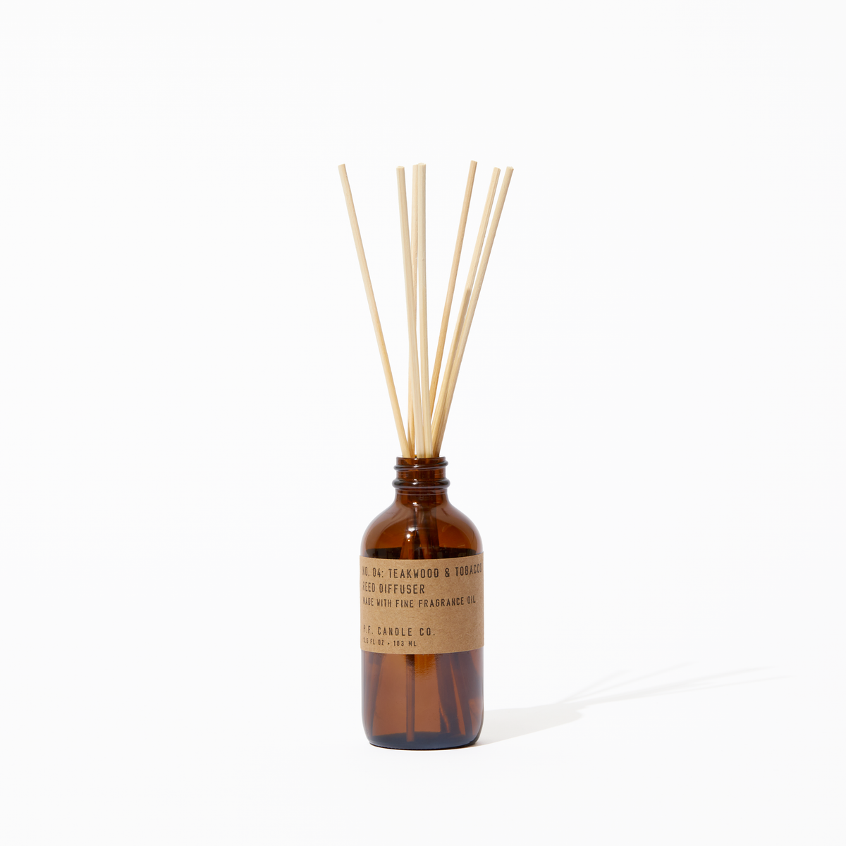 P.F. Candle Co. Teakwood & Tobacco Reed Diffuser - Product - Packaged in apothecary-inspired amber glass bottles with our signature kraft label and rattan reeds. Low-maintenance scent throw, all day long - no match necessary.