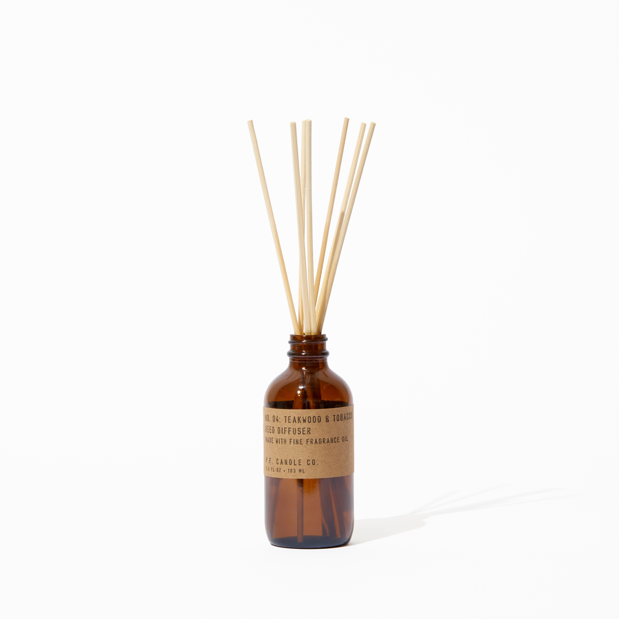 P.F. Candle Co. Teakwood & Tobacco Reed Diffuser - Product - Packaged in apothecary-inspired amber glass bottles with our signature kraft label and rattan reeds. Low-maintenance scent throw, all day long - no match necessary.